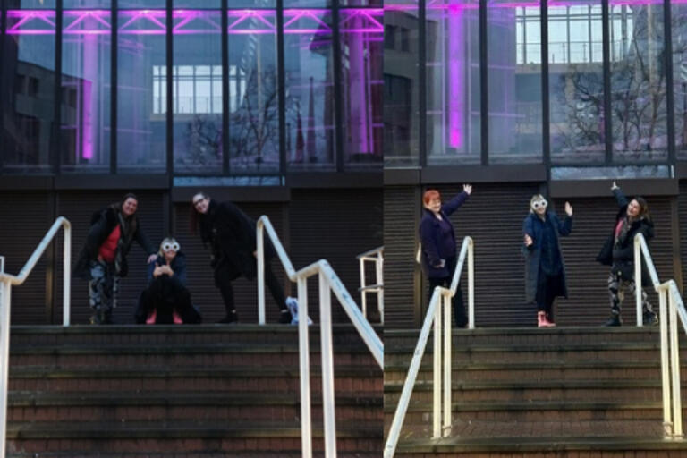 Four of our employee network leads outside County Hall which is lit up in the colour purple for International Day of People with Disabilities