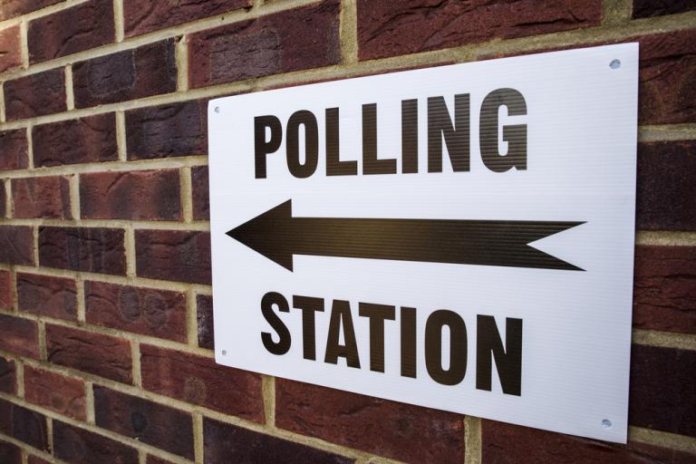 Sign saying polling station