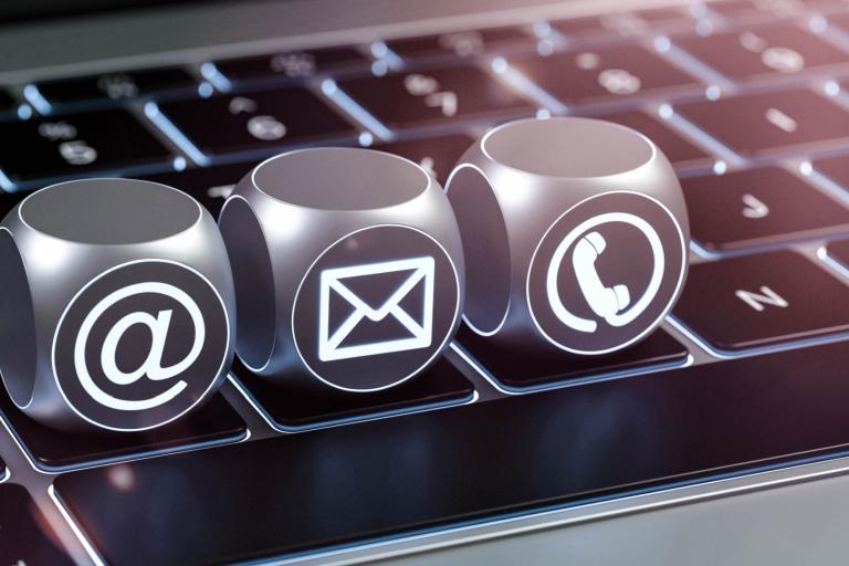 Keyboard with keys for email, telephone, message on top 