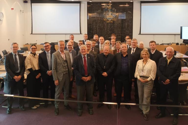 A photograph of a group of people who make up the Essex Chief Executive and Leaders group - Nicole is pictured on the right of the picture wearing white blouse and trousers 