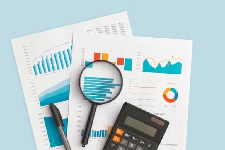 Business graphs and charts on table. Financial development, Banking Account, Statistics