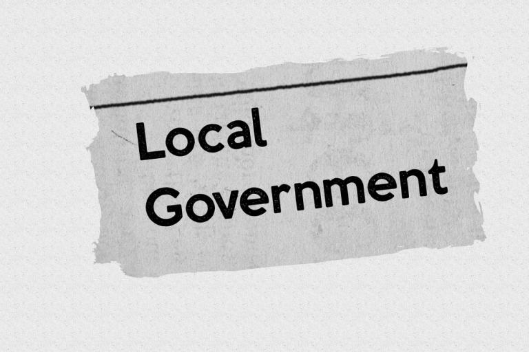 Plain background with the words local government written on
