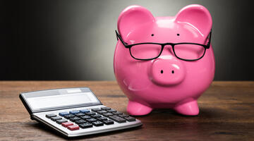 piggy bank and calculator