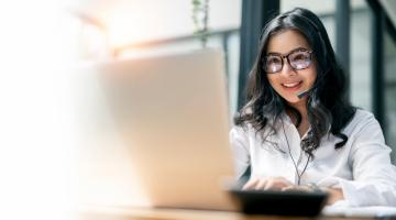 woman making call on laptop