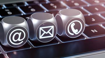 Keyboard with keys for email, telephone, message on top 