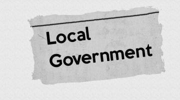 Plain background with the words local government written on