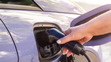 Car being charged by EV charger 