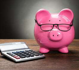 piggy bank and calculator