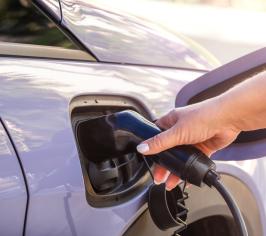 Car being charged by EV charger 